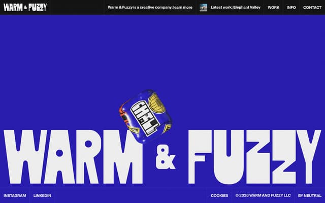 Cobalt blue footer with oversized wordmark on warmnfuzzy.tv